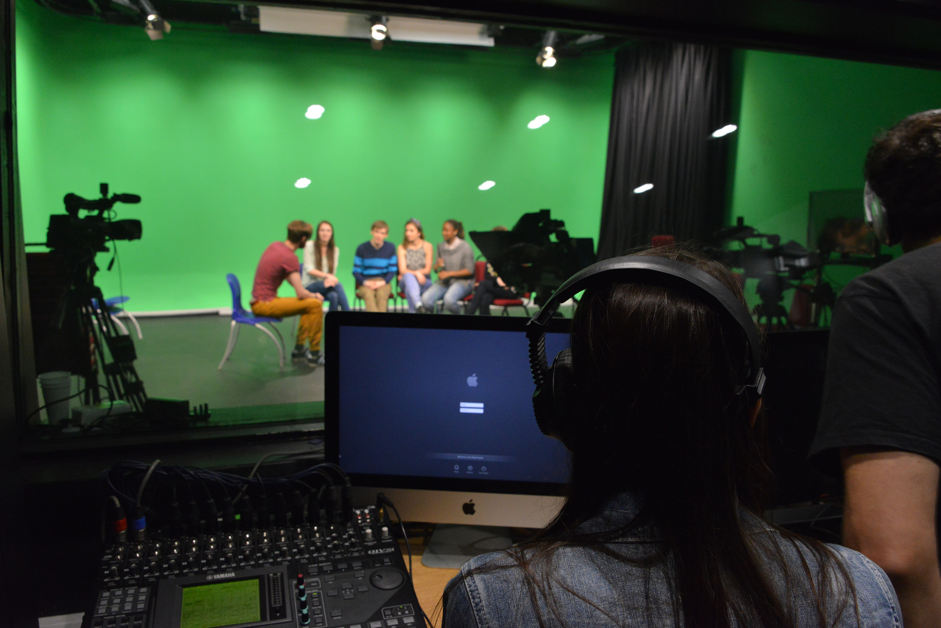 People being filmed in the TV studio