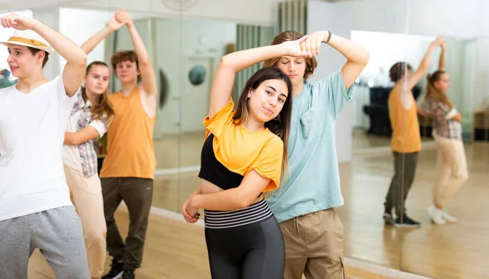 Couples dance together on a performing arts course at St Mary's University, London.