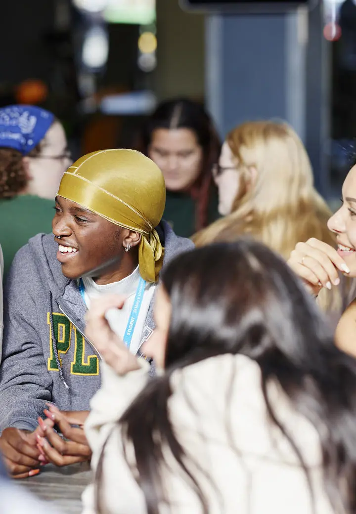 students laughing chatting