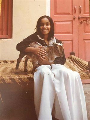 Shabana Marshall, aged 8, with her goat Lily