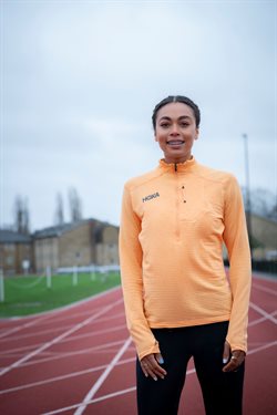 Adelle Tracey standing on the St Mary's University running track.